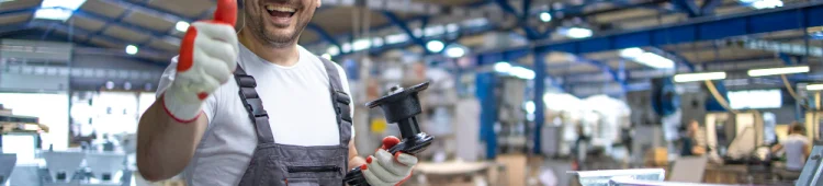portrait-factory-worker-protective-equipment-holding-thumbs-up-production-hall portrait-factory-worker-protective-equipment-holding-thumbs-up-production-hall